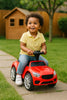 Kid on play vehicle 