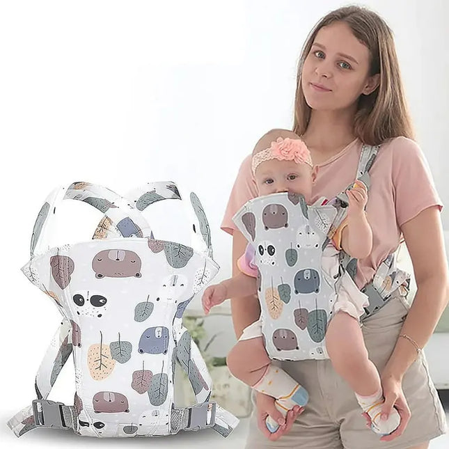 Woman holding a baby in a baby carrier with a white background