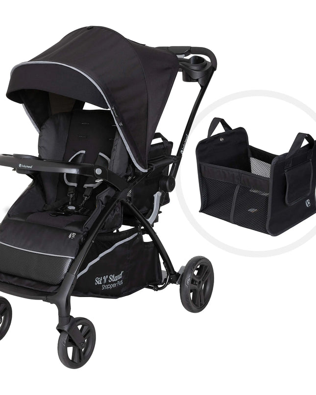 Black stroller with a small storage basket attached on a white background