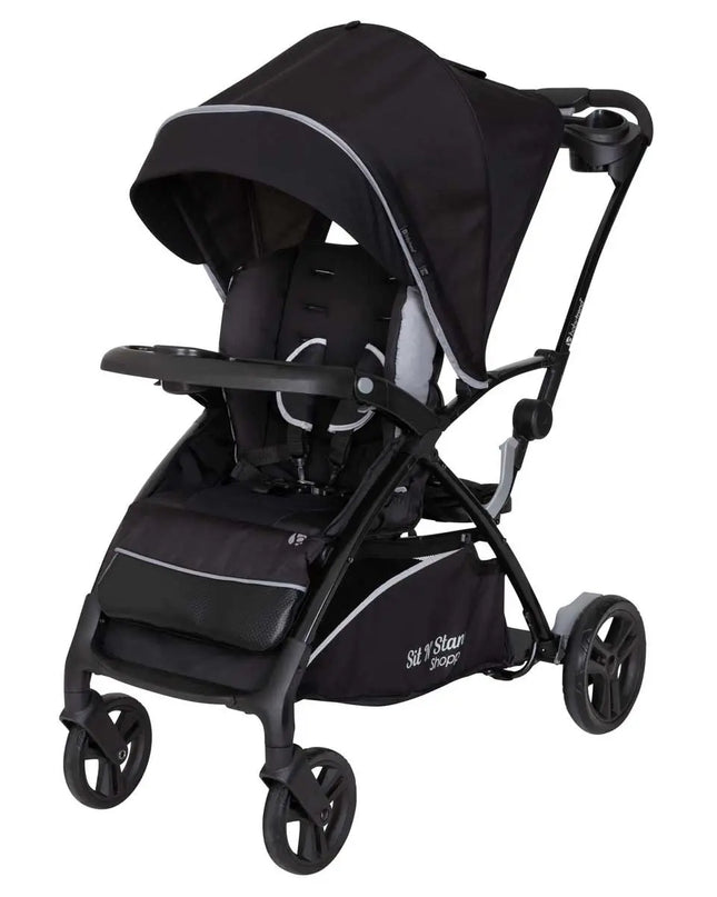 Black stroller with canopy on a white background