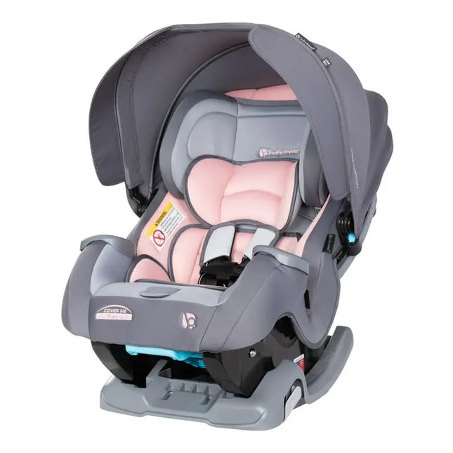 Gray and pink baby car seat on a white background