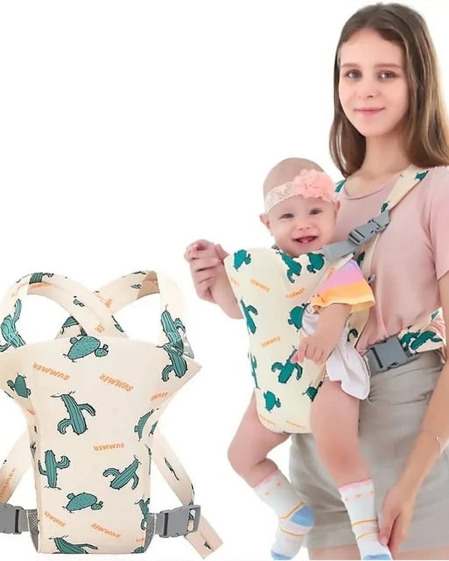 Woman holding a baby in a patterned baby carrier with a plain background