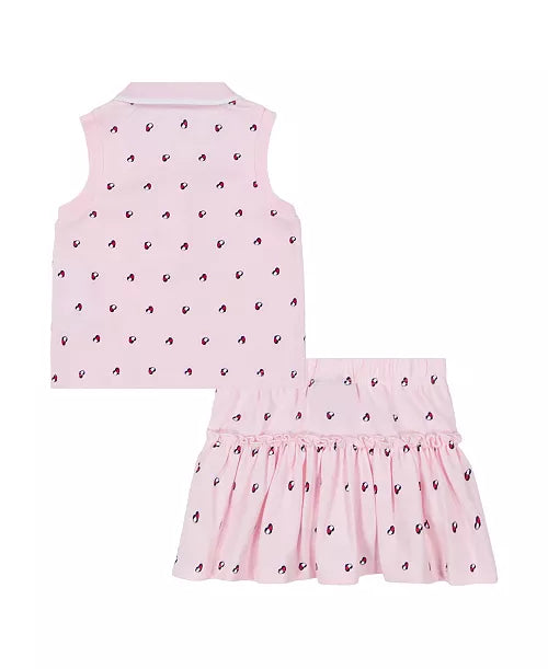 Pink sleeveless top and skirt set with black heart pattern on a white background