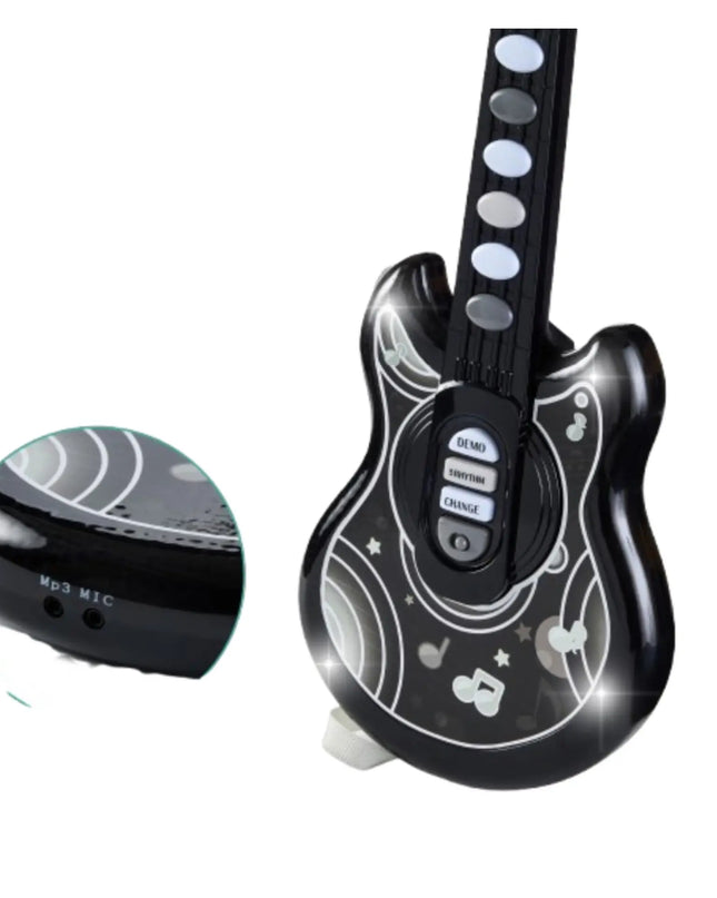 Black electronic guitar toy with white designs on a white background
