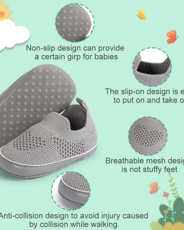 Gray baby shoes with features highlighted on a light green background