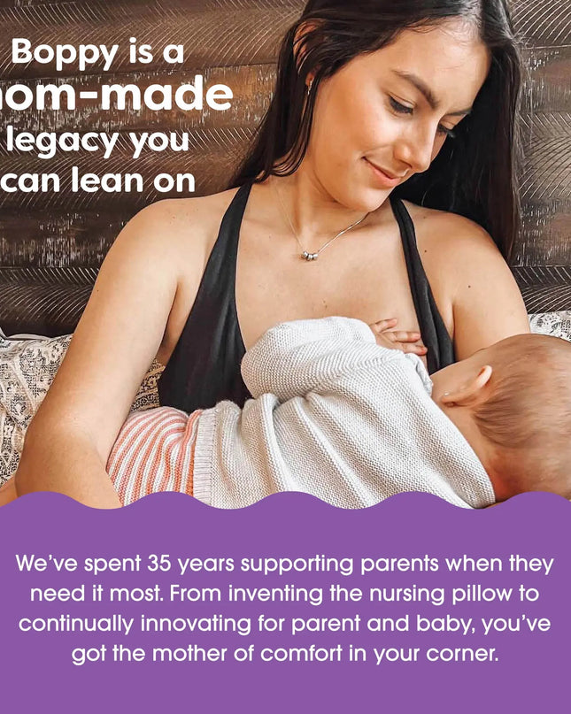 Woman holding a baby with promotional text about Boppy products.