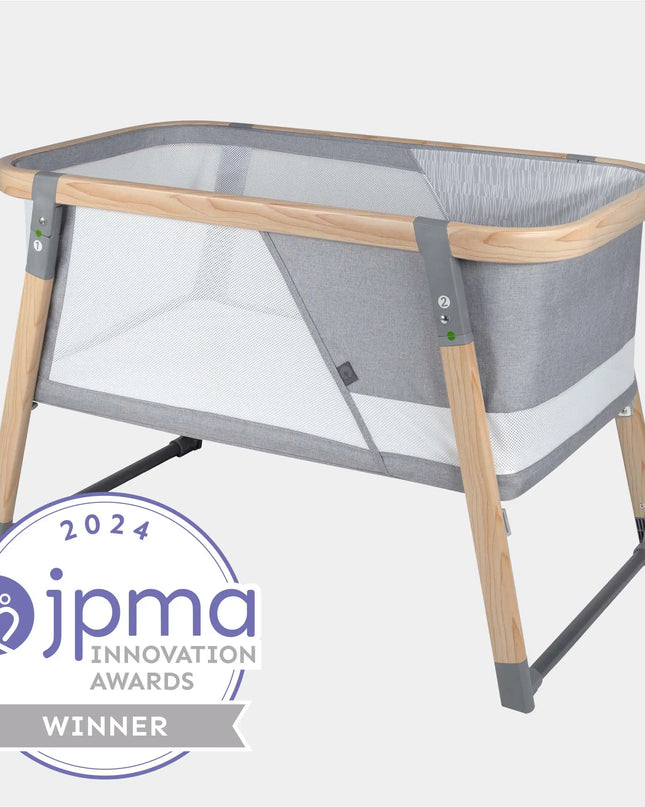 Portable crib with JPMA Innovation Awards 2024 badge on a white background