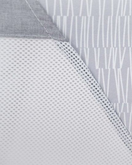 Close-up of textured gray fabric with a subtle pattern