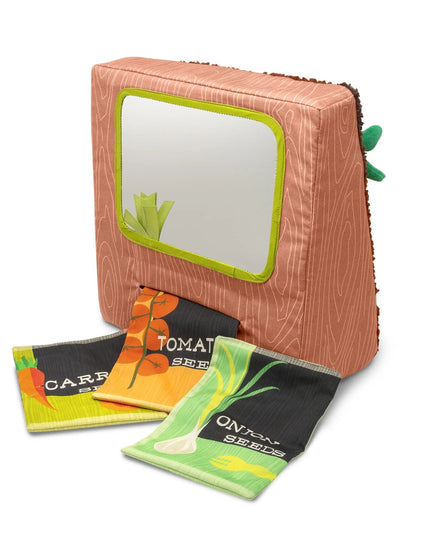 Set of seed packets with a wooden box on a white background