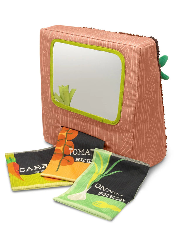 Set of seed packets with a wooden box on a white background