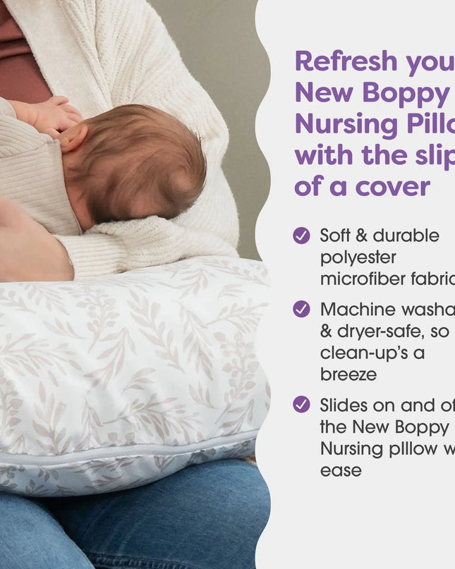 Person using a Boppy nursing pillow with a baby, text about the product's features.
