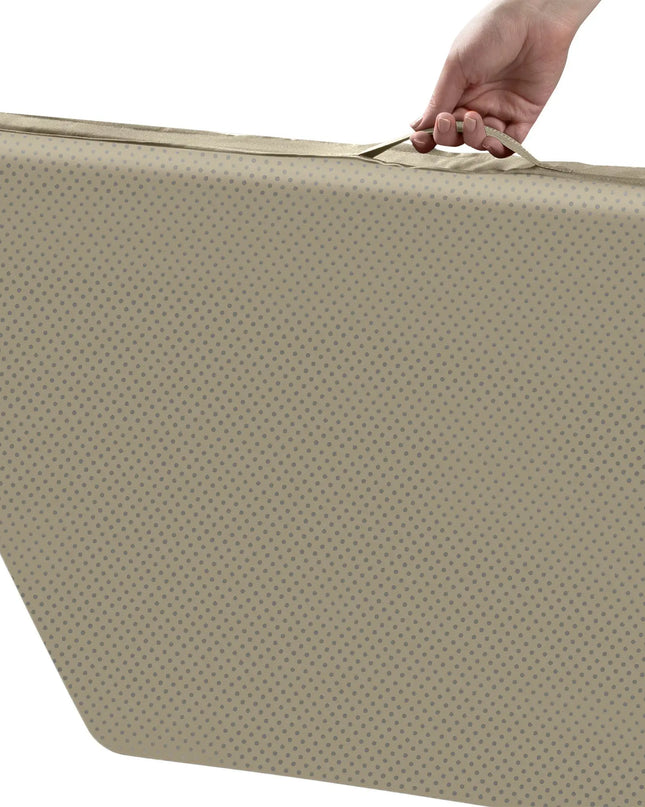 Beige mattress cover with a hand holding the zipper on a white background