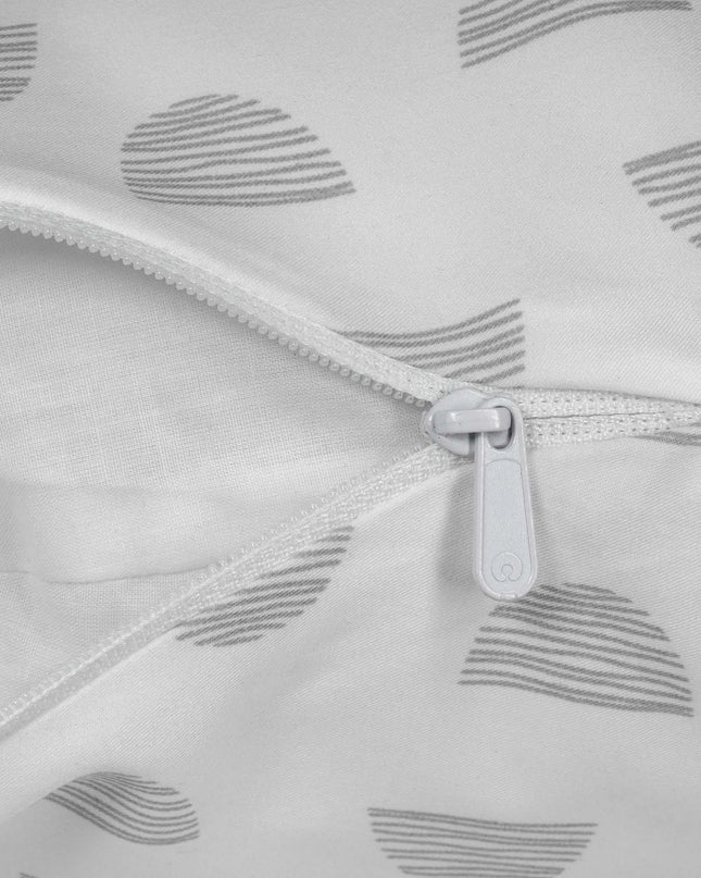 Close-up of a light gray fabric with zipper and subtle pattern