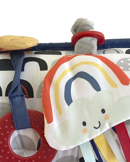 Children's toy with rainbow design on a white background