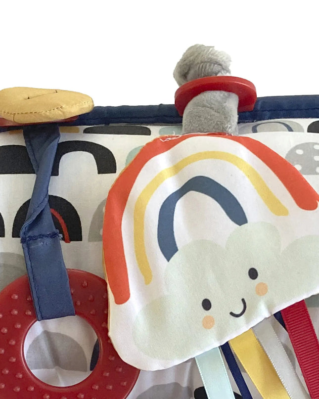 Children's toy with rainbow design on a white background