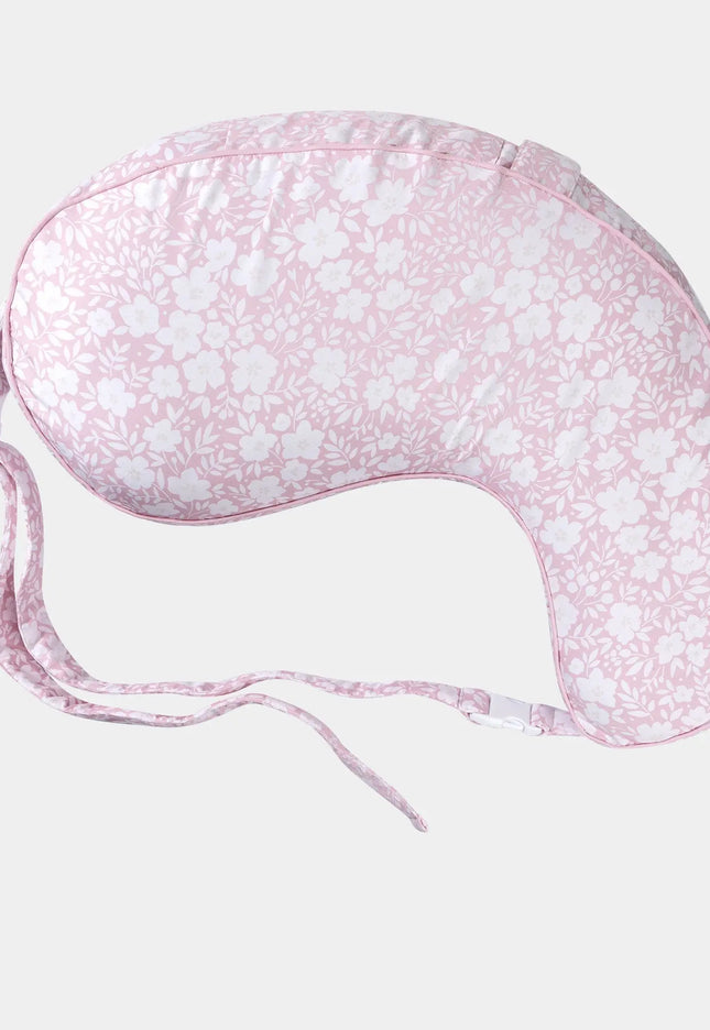 Pink floral eye mask on a light gray background