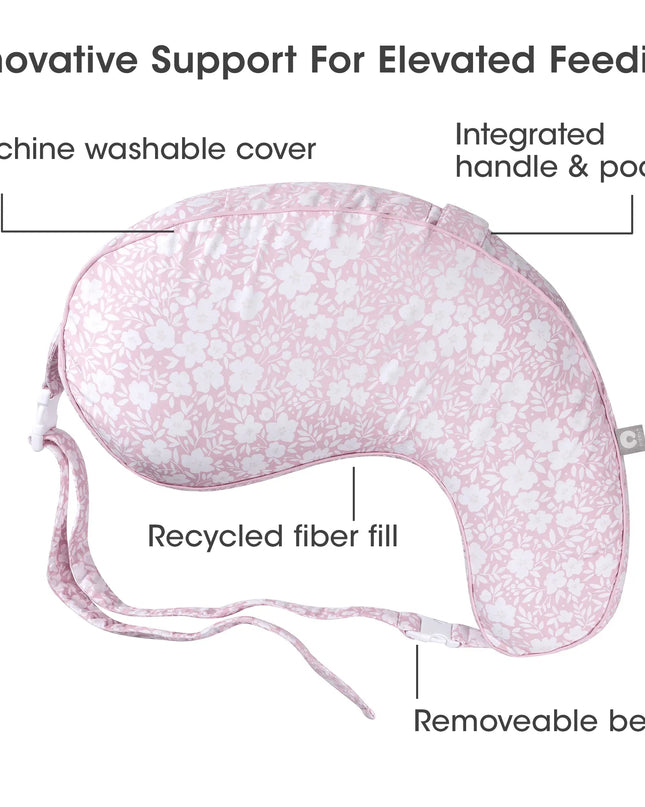 Pink baby feeding pillow with features labeled on a white background