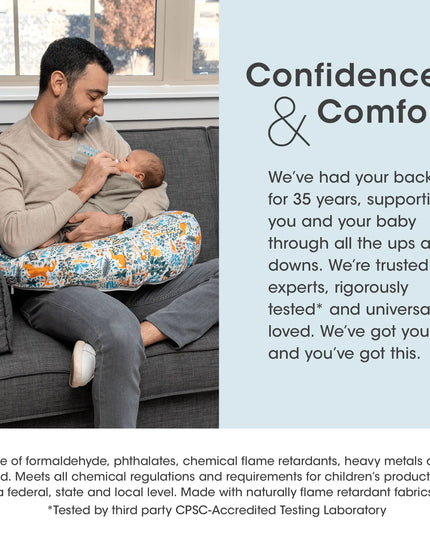 Man holding a baby in a supported seat with text about product trustworthiness and safety.