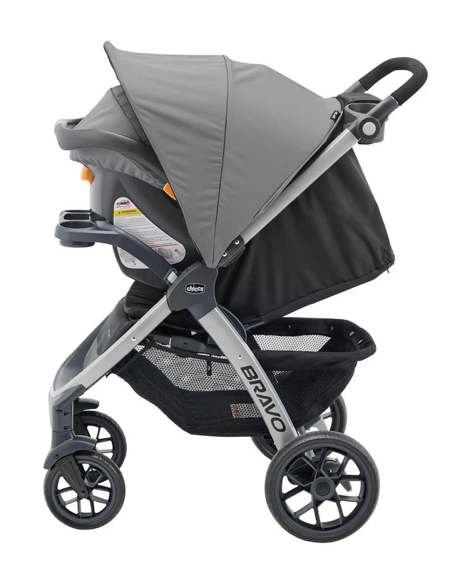 Gray and black stroller with canopy on a white background
