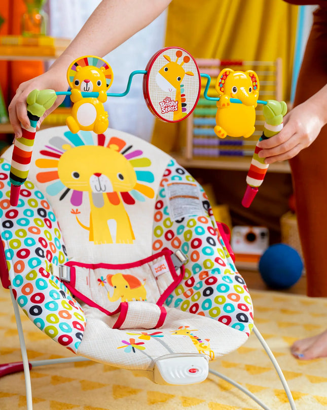 Bright Starts Playful Pinwheels Portable Baby Bouncer with Vibrating Infant Seat for Ages 0-6 Months (Unisex)