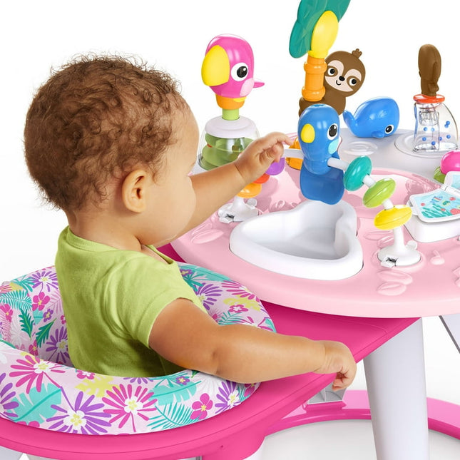 Child playing with a colorful baby activity center