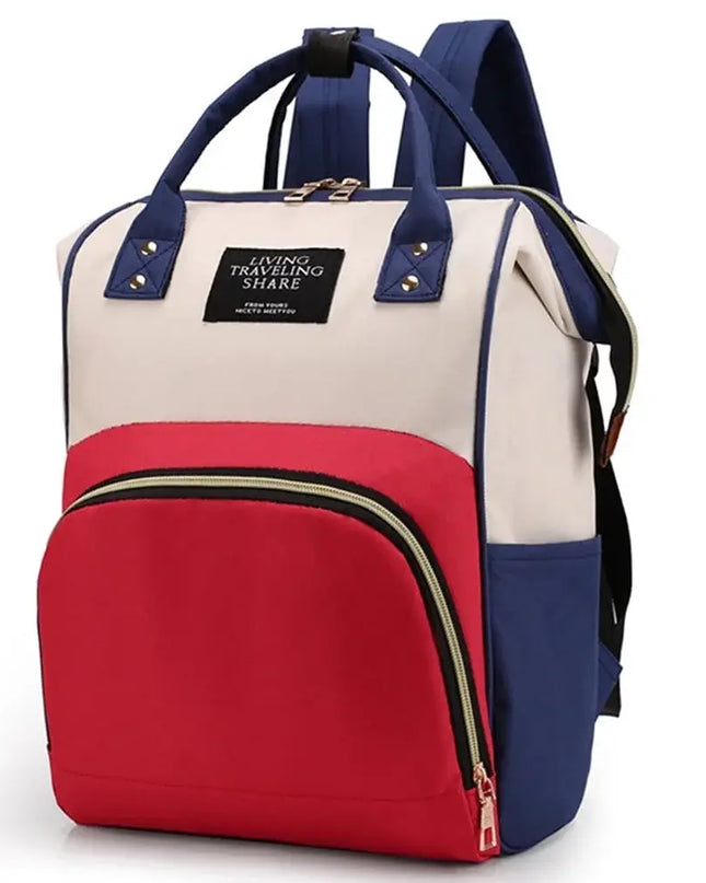 Multicolored backpack with red, white, and blue sections on a white background