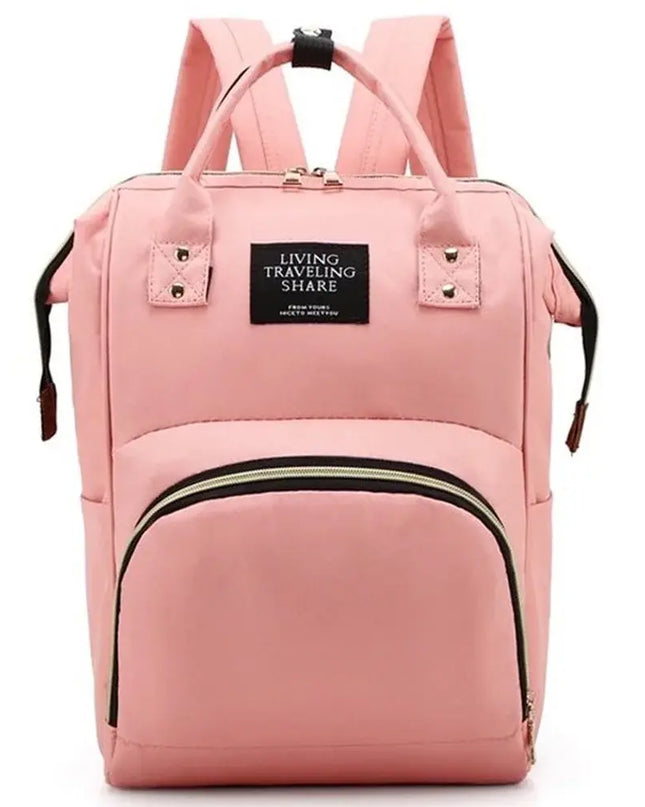 Pink backpack with a visible brand label on a white background
