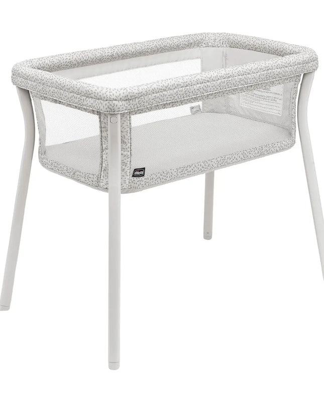 White crib with gray textured sides on a white background