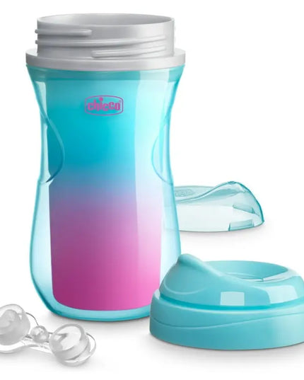 Gradient blue and pink sippy cup with additional components on a white background