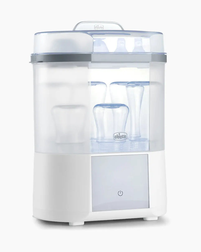 White baby bottle sterilizer with clear container on a white background
