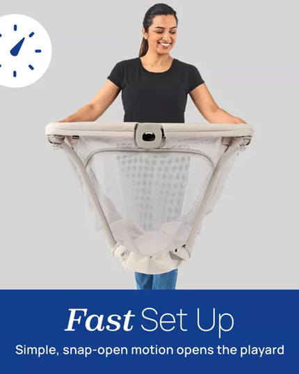 Woman holding a portable playard with text 'Fast Set Up' on a gray background