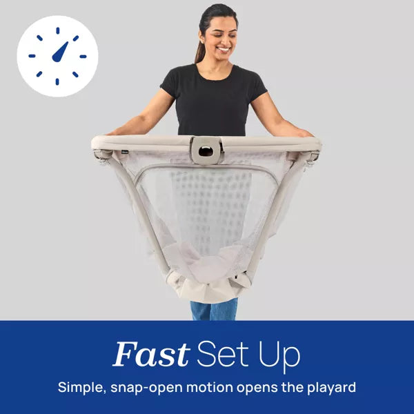 Woman holding a portable playard with text 'Fast Set Up' on a gray background