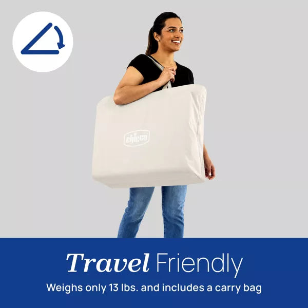 Woman holding a large white bag with text about travel friendliness on a gray background