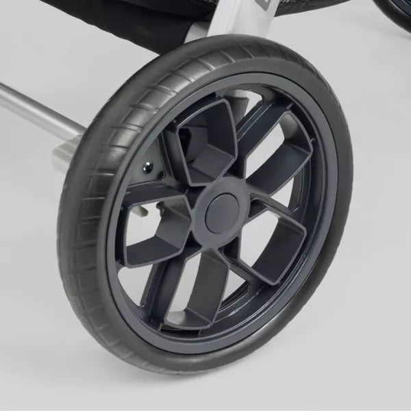 Close-up of a black wheel with a white background