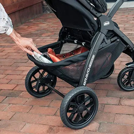 Black Bravo stroller on a brick pavement