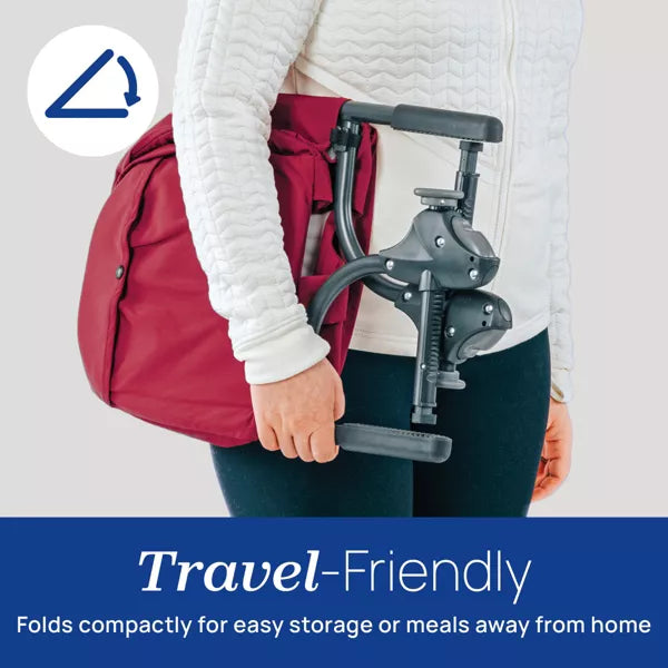 Person holding a travel-friendly device with a red backpack, emphasizing portability.