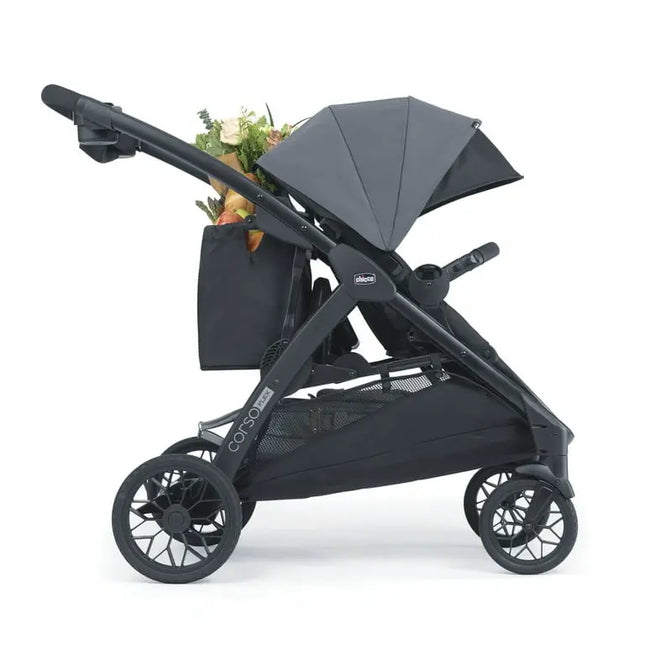 Black stroller with a gray canopy on a white background