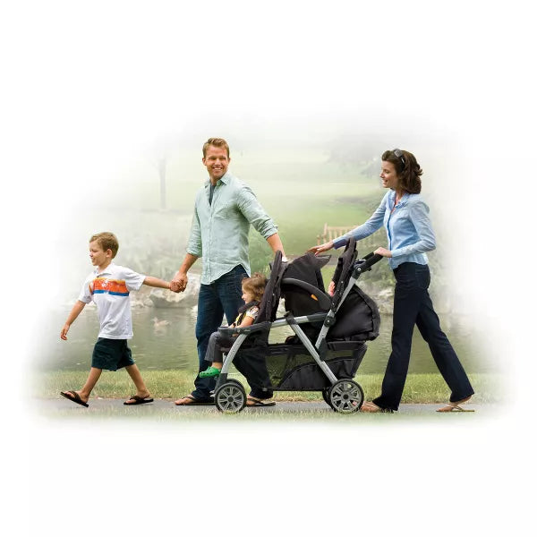Family walking with a stroller on a foggy day