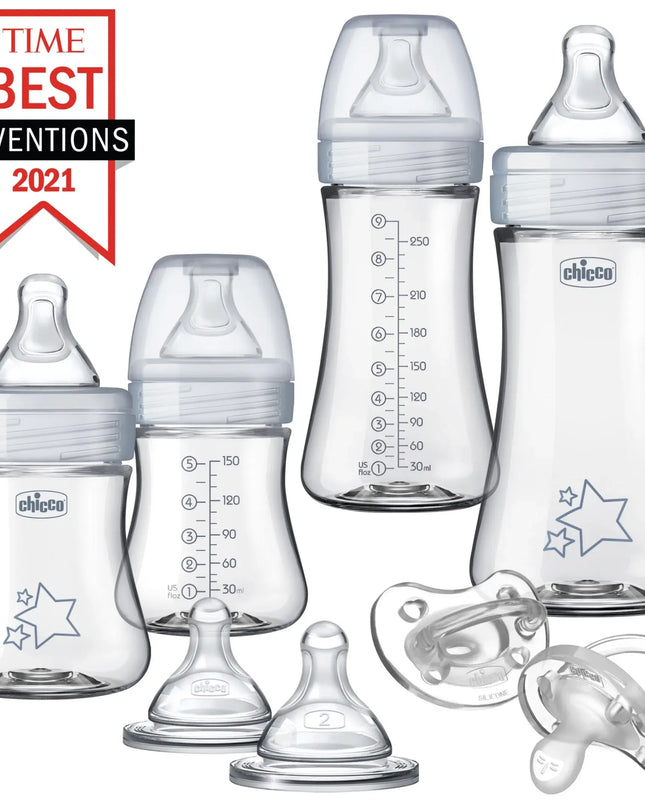 Set of clear baby bottles and pacifiers with Chicco logo, featuring 'Time Best Inventions 2021' award.