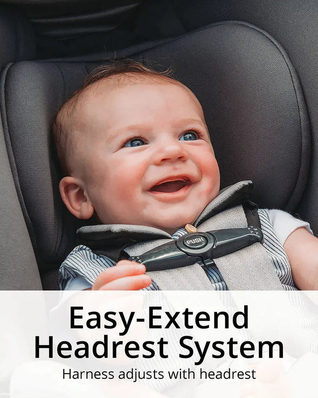 Baby in a car seat with an 'Easy-Extend Headrest System' label.