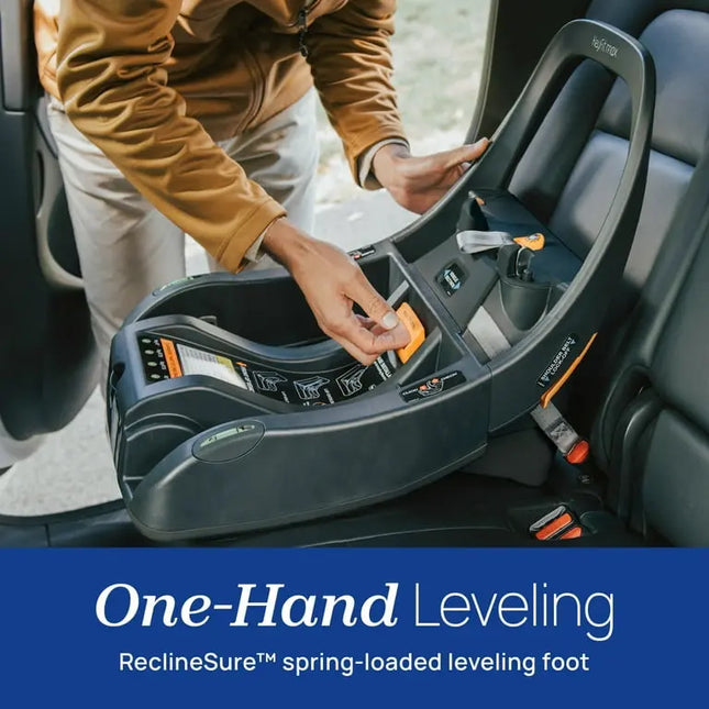 Person installing a car seat with 'One-Hand Leveling' feature in a vehicle.