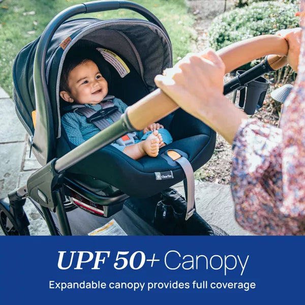 Child in a stroller with an expandable canopy, featuring UPF 50+ protection.