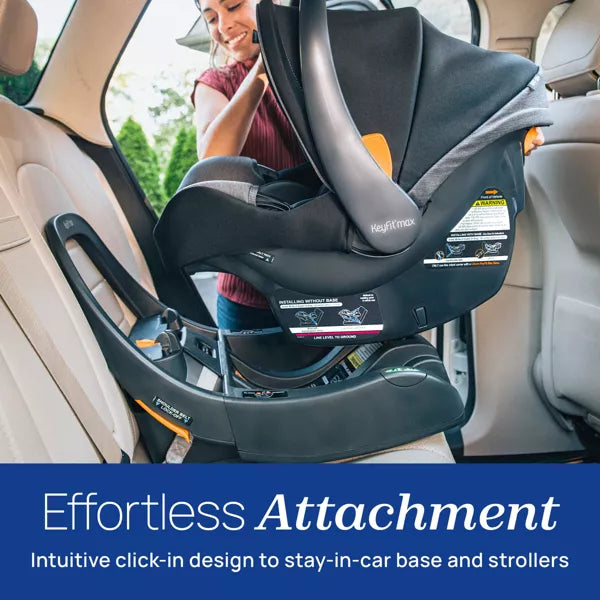 Baby car seat being installed in a vehicle with a woman assisting, emphasizing 'Effortless Attachment' feature.