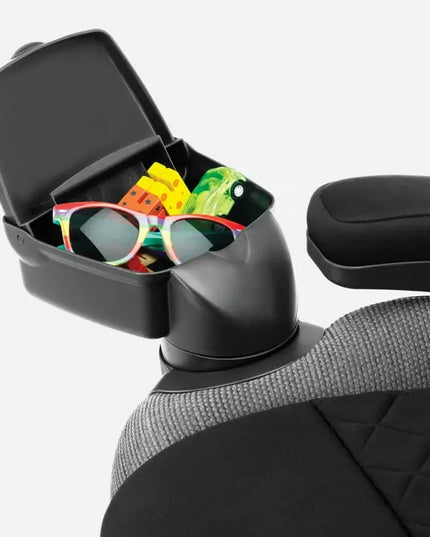 Car cup holder with sunglasses and snacks on a white background