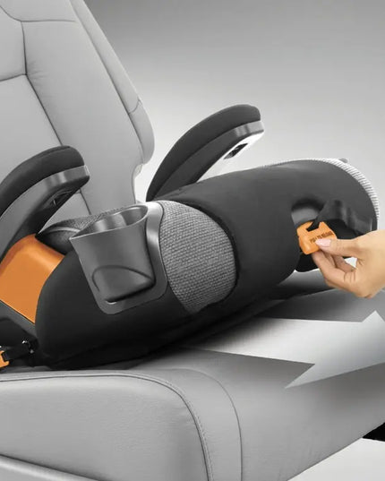 Child car seat being adjusted in a car with a hand reaching in to tighten the straps.
