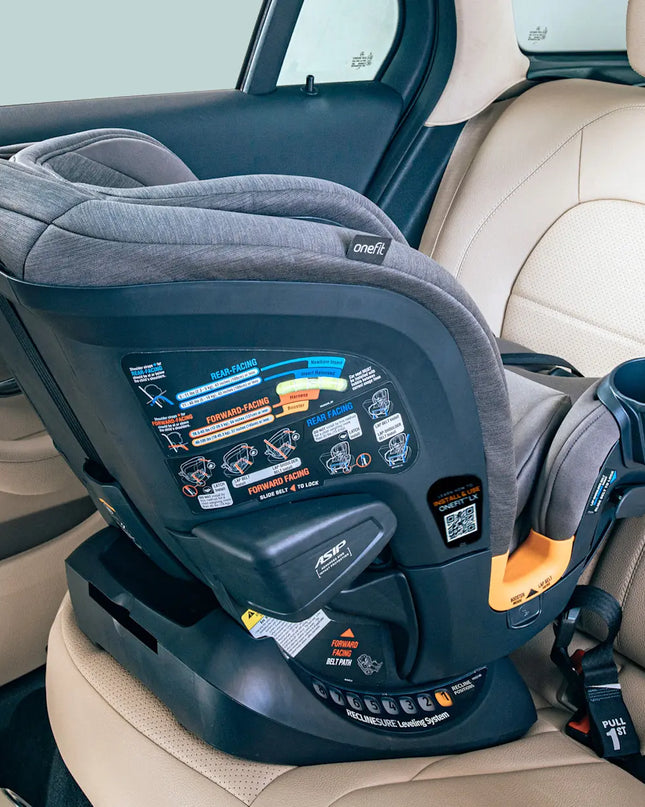 Gray car seat with visible branding in a vehicle interior