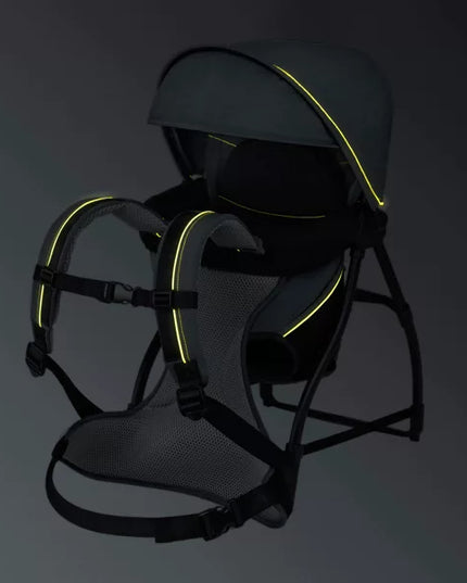 Black baby carrier with yellow accents on a dark background