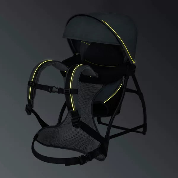 Black baby carrier with yellow accents on a dark background