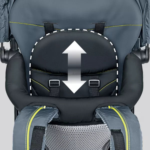 Close-up of a child safety seat with an arrow indicating the direction of the harness straps.