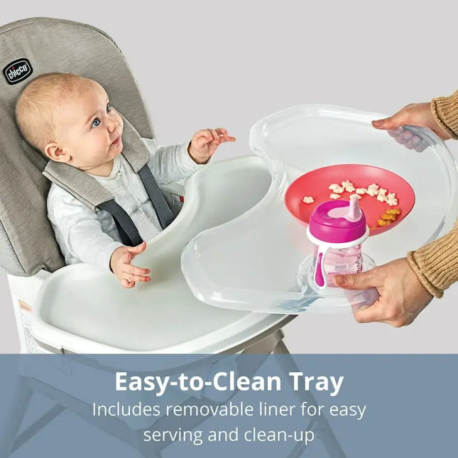 Baby in a high chair with a tray and cup, featuring text about an easy-to-clean tray.